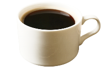 A white ceramic cup filled with black coffee, viewed from a slight angle against a plain background.